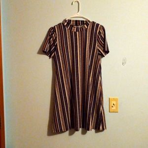 Knee length T-shirt dress.